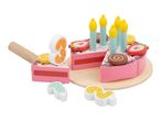 Wooden toy birthday cake with candles, fruit toppings, and number pieces 1, 2, and 3.