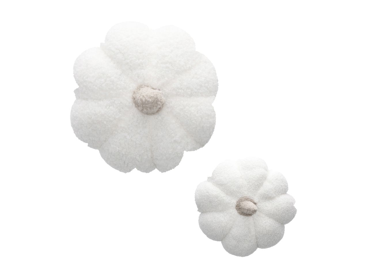 Two white plush pumpkin decorations with light brown centers.