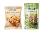 To poser Alesto nødder: macadamianødder og pistacienødder.