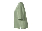 Light green short-sleeved top with a textured fabric, side view.