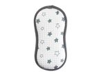A gray-trimmed white pot holder with a star pattern.