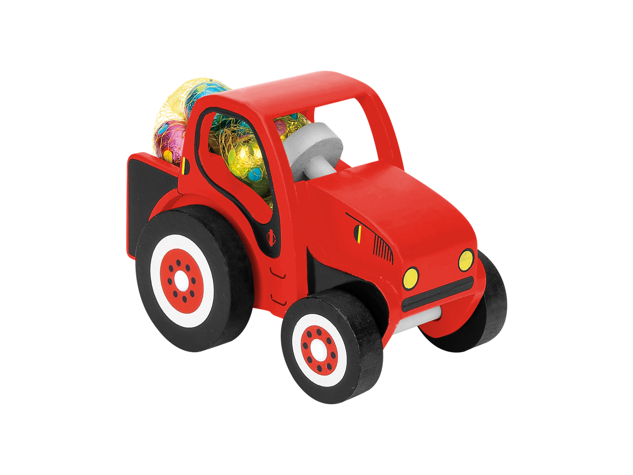 Crveni drveni traktor Favorina sa čokoladnim uskršnjim jajima na crnoj pozadini.