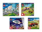 Vier LEGO-Boxen, darunter LEGO City Straßenplatten, LEGO Friends Pferdetransporter, LEGO City Raumschiff und LEGO City Traktor.