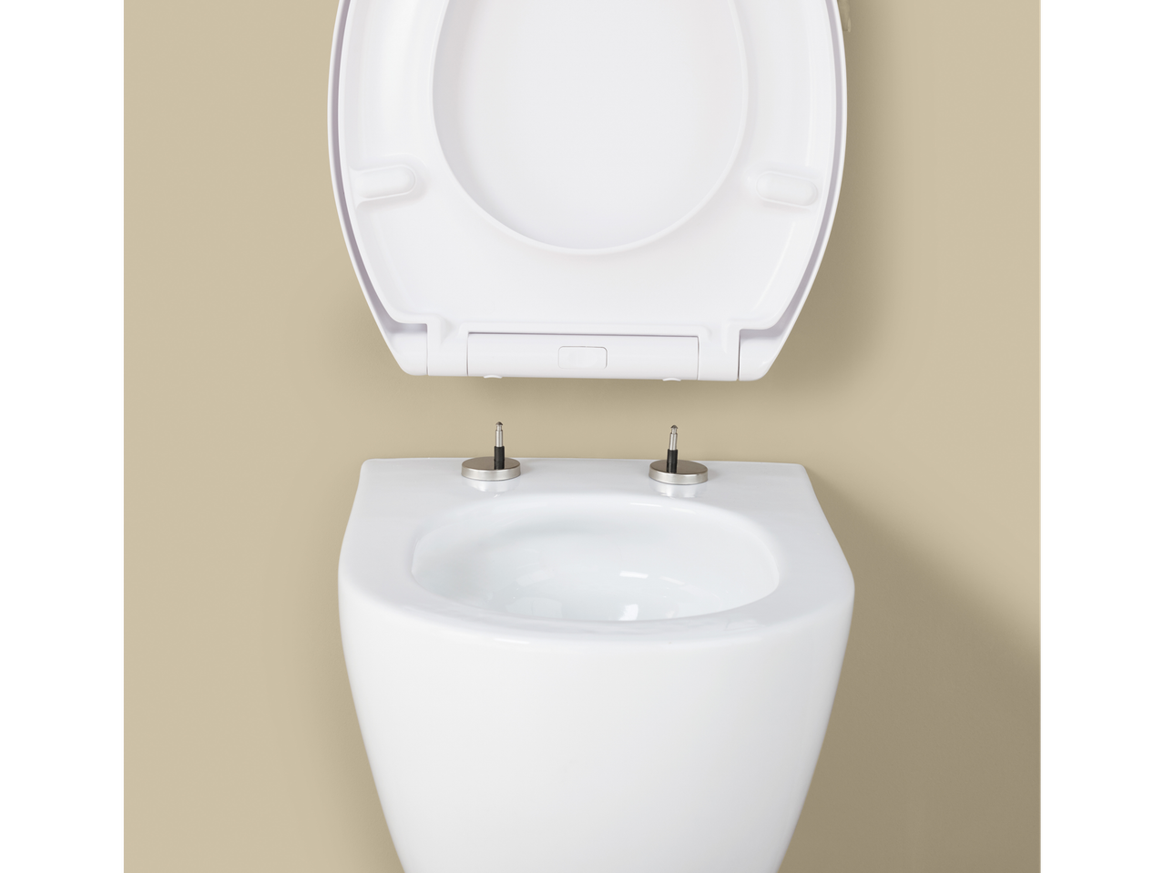 White LIVARNO Duroplast toilet seat with an open lid on a beige wall.