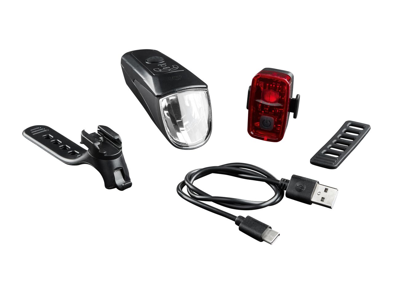 Komplet kolesarskih luči Sigma, vključno z glavno lučjo in zadnjo lučjo, ter USB polnilnim kablom.