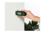 A hand holds a Parkside moisture meter against a white wall, displaying 0.0% moisture.