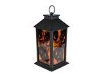 Black Halloween lantern with orange glass panels featuring jack-o'-lanterns
