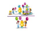 Toy ice cream truck with two figures, a robot, and a sign with balloons and popsicles.