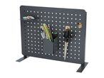 Dark grey pegboard with a shelf, pencil holders, and scissors, for desk organization.