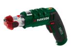 A green and black cordless screwdriver with a red tip and a clear bit magazine.