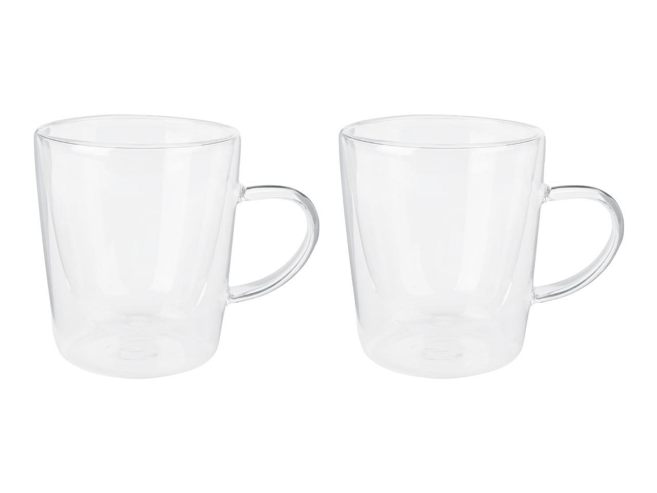 Two clear glass mugs with handles, isolated on a white background.