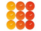 Nine tea light candles in varying shades of orange and red, arranged in a grid.
