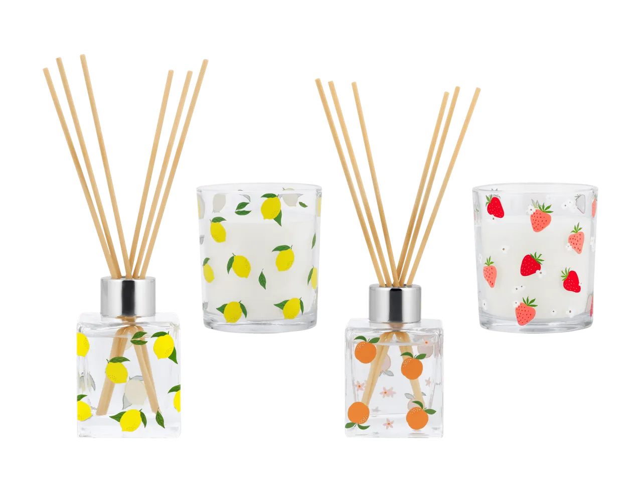 Deux diffuseurs et deux bougies avec des motifs de citrons, d'oranges et de fraises.