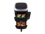 Dual-basket air fryer with grilled chicken, green beans, chicken wings, and fries.