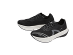 Crivit black running shoes with white soles and grey accents
