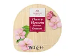 Japanese-style cherry blossom flavour dessert, 150g, on a bamboo mat background.
