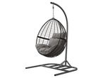 Modern rattan hanging chair with cushions.