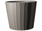 A taupe-colored, fluted planter sits against a black background.