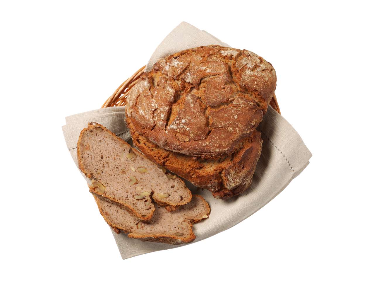 Košara s hlebcem in rezinami orehovega kruha na belem prtu.