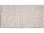 Light beige bath mat with a geometric maze pattern