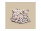 Floral patterned bedding set with two pillows and a folded duvet
