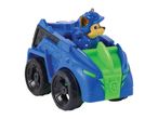 Blue and green toy car with a brown and tan dog figure wearing a blue helmet.