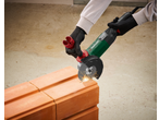 Parkside Performance® PWS 125 angle grinder cutting bricks with sparks
