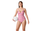 Costum de baie întreg CRIVIT pentru femei cu model chevron roz-albastru, ținând o minge de volei.