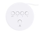 White round remote control with four buttons and a central button.