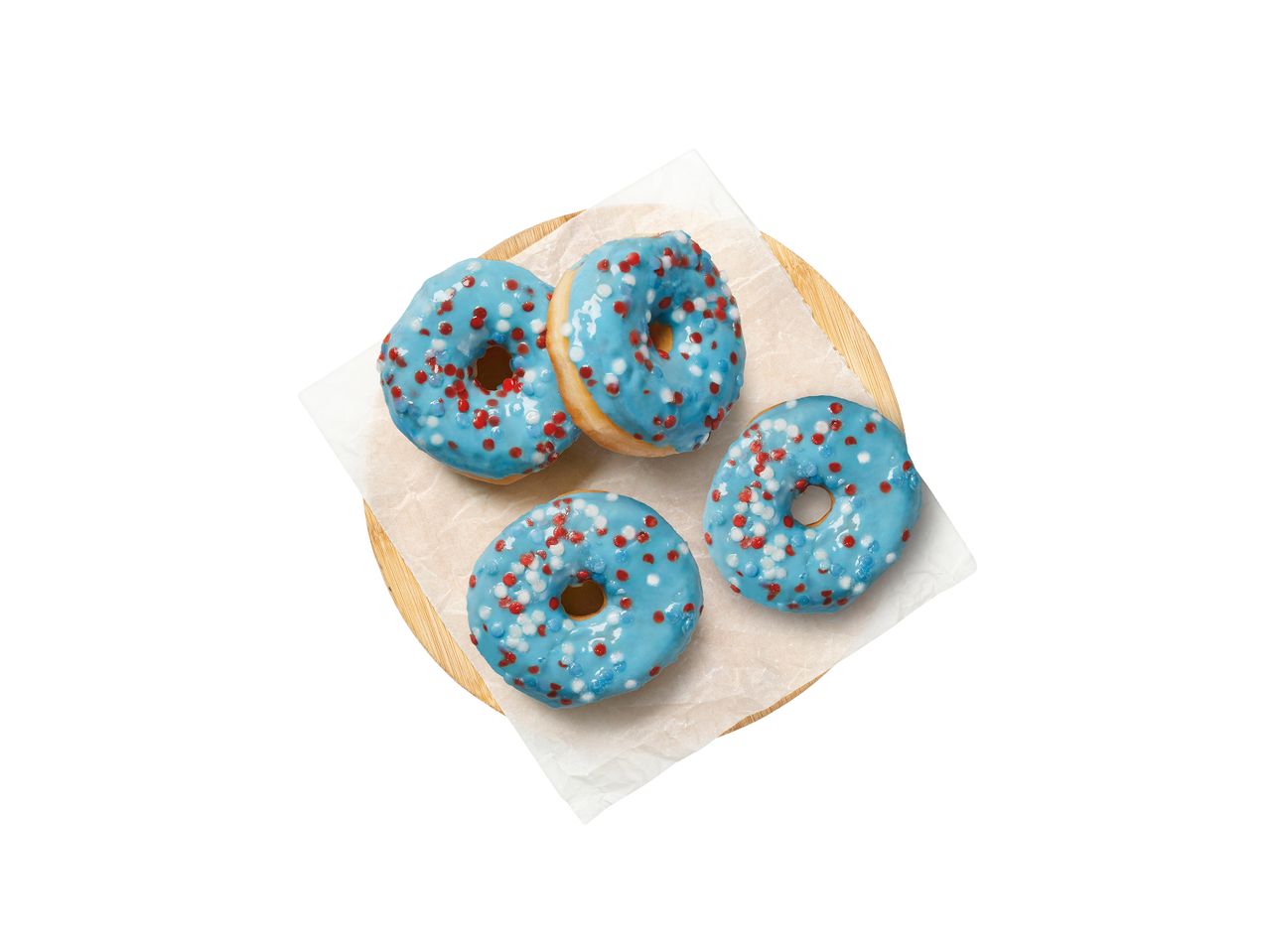 Τέσσερα ντόνατς με γλάσο και πολύχρωμη τρούφα σε ξύλινη βάση.