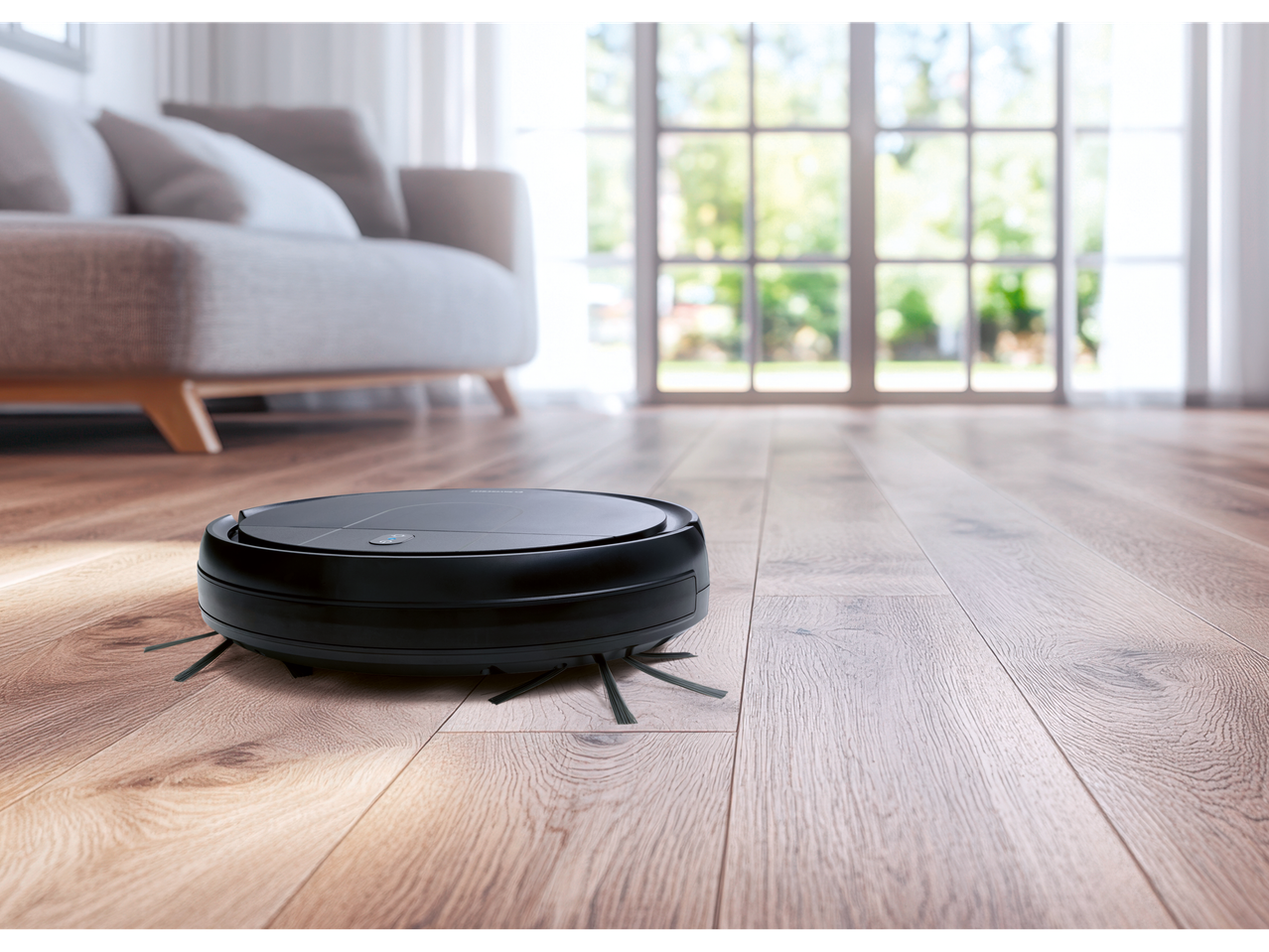 SILVERCREST® Robot Vacuum Cleaner on a wooden floor in a modern living room.