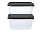 Two clear rectangular food storage containers with black lids, stacked on a white background.