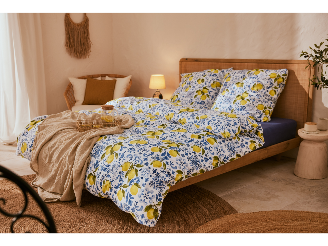 Lemon-print bedding, Mediterranean style bedroom.