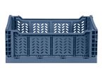 Blue plastic foldable storage crate with ventilation holes