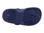 Bottom view of a dark blue children's clog with a textured sole and brand name.