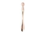 Rose gold eye massager with a spherical head and a tapered handle.