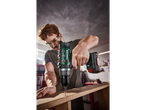 Man using a Parkside cordless drill for woodworking.