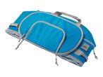 A bright blue, foldable travel organizer with multiple compartments and a carrying handle.