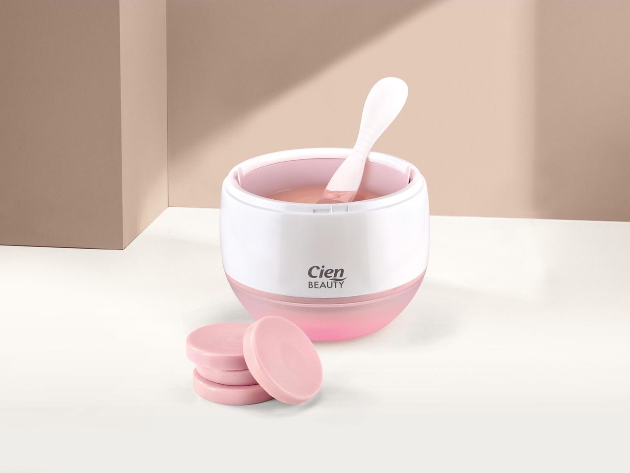 Cien Beauty gyantamelegítő és rózsaszín gyantakorongok.