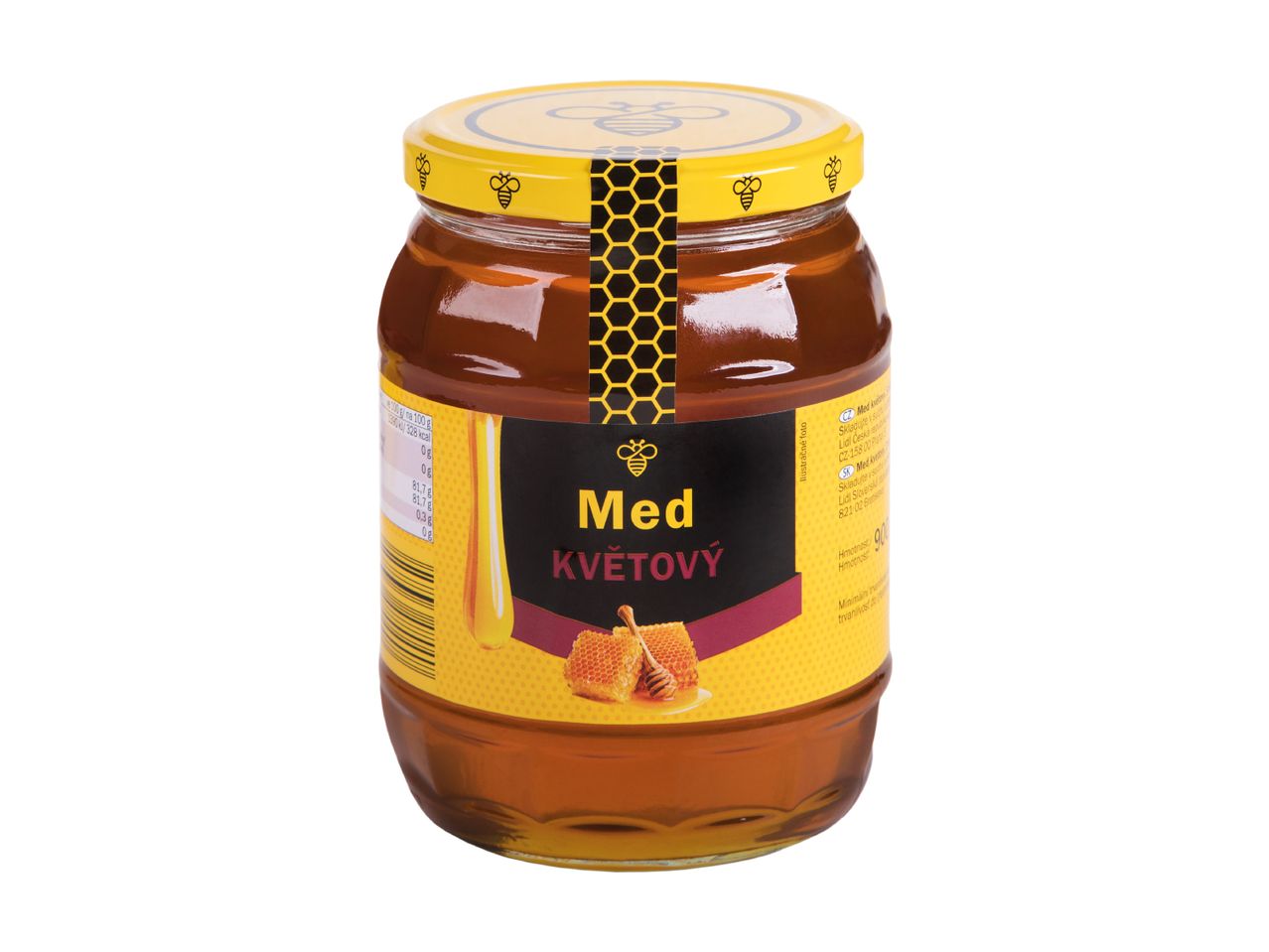 Sklenice květového medu s obrázkem včel a pláství.