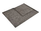 Grey patterned fleece blanket with a folded corner