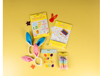 Easter egg hunt kit, colouring set, bunny ears, gel window stickers, and fillable eggs on yellow.