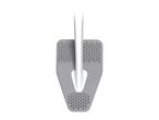 Gray cleaning pad with a white handle, featuring textured nubs for scrubbing.