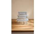 SILVERCREST® Glass Food Storage Containers stacked on a wooden surface.
