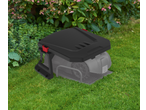 PARKSIDE robotic lawnmower garage, black, in a green garden.