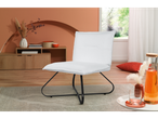 LIVARNO home white chair with black metal legs on a rug in a living room.