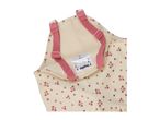 Cream-colored children's rain dungarees with pink floral print and pink adjustable straps.