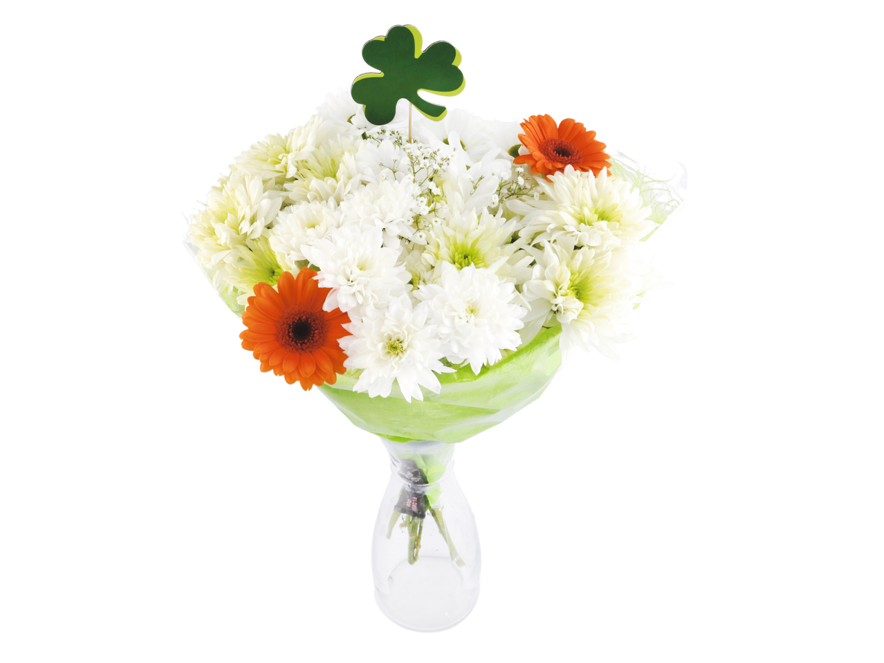A bouquet of white and orange flowers with a green shamrock decoration.