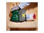 A cordless multi-sander being used to sand the inside corner of a wooden shelf.