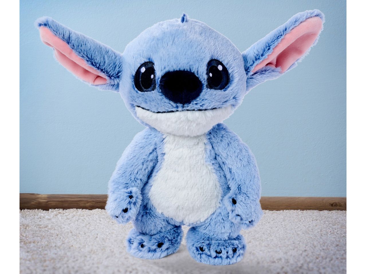 Adorable Stitch plush toy from Disney's Lilo & Stitch.